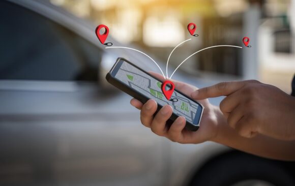 man-makes-use-gps-internet-online-map-car-controls-navigator-gps-tracking SBB AG: Data-driven electrification of the fleet on the path to climate neutrality